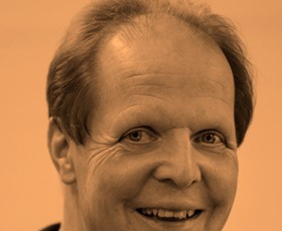 Headshot of David Riddell