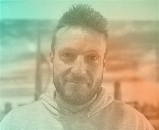 Headshot of Adam Henderson