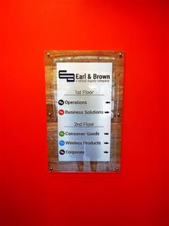 Branded indoor and outdoor wayfinding signs for Earl & Brown