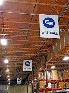 Branded indoor and outdoor wayfinding signs for Earl & Brown