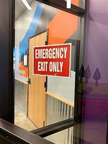Emergency exit signs and maps that are compliant