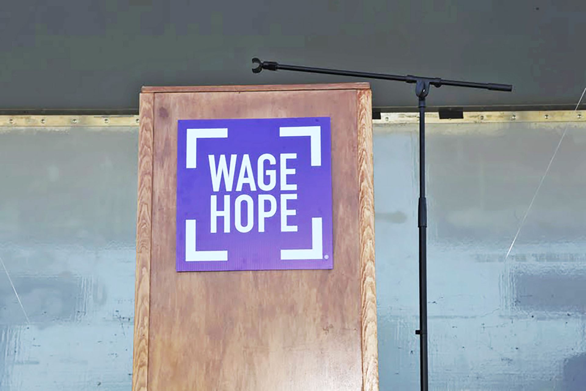 Wage Hope Podium Sign