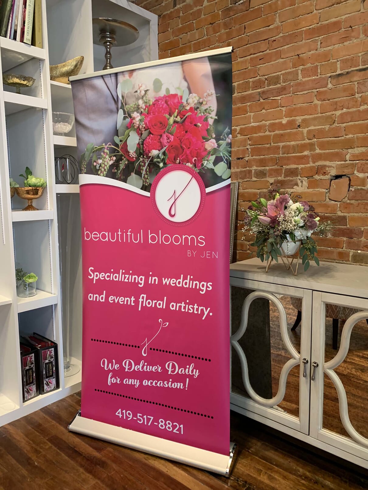 custom pink banner stand in flower shop