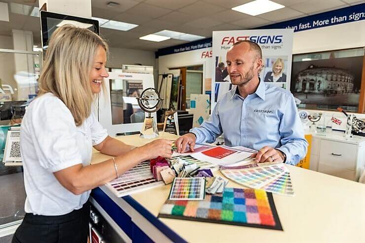 Two People choosing from color palette