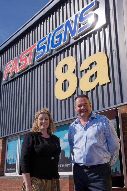 Penny Mordaunt MP and FASTSIGNS® Portsmouth Director, Glenn Turnbull