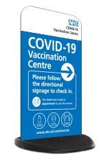 covid vaccination center pavement signage